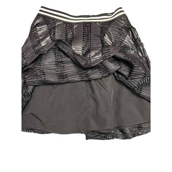 BCBGeneration Mini Skirt Size 0 Black Shine Lasercut Eyelet Back Zip NWT - Picture 3 of 10
